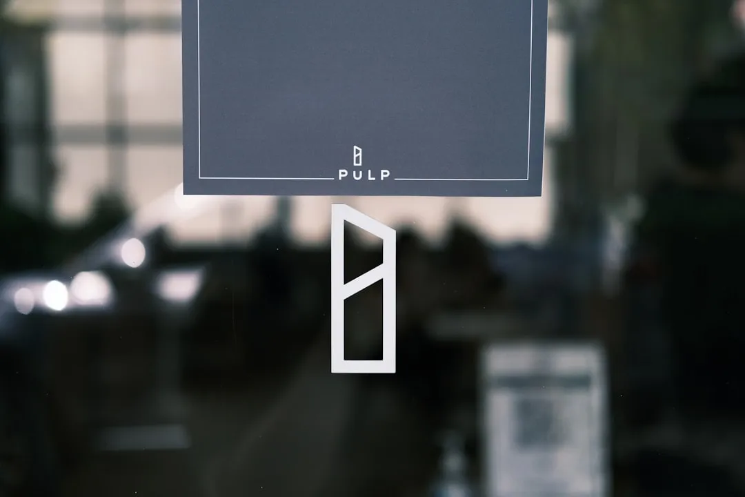 robotic hand touching touchscreen interface