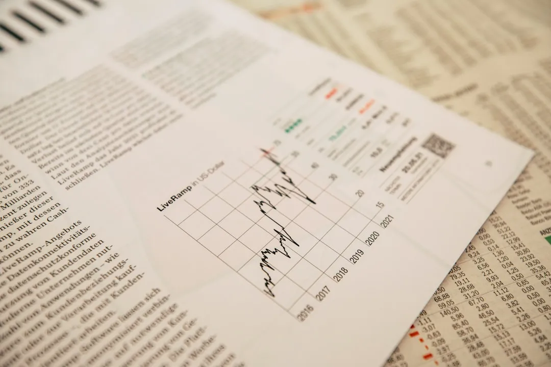 magnifying glass over financial chart